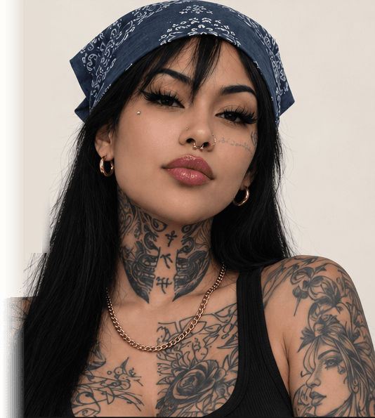 Portrait of the artist with black and grey tattoos